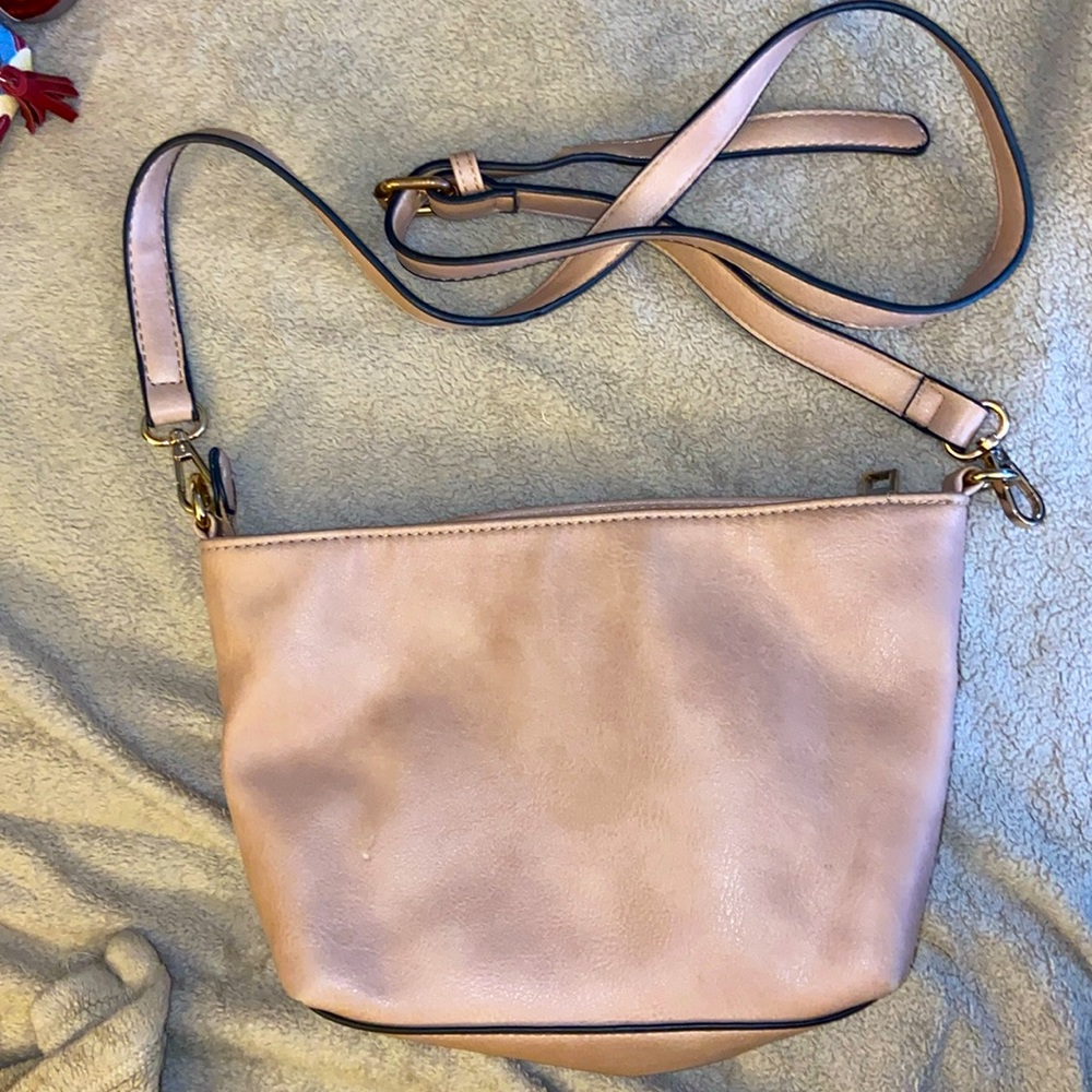 Pink handbag with adjustable strap